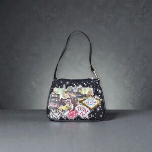 Las Vegas Themed Black Wristlet with bead work on front.